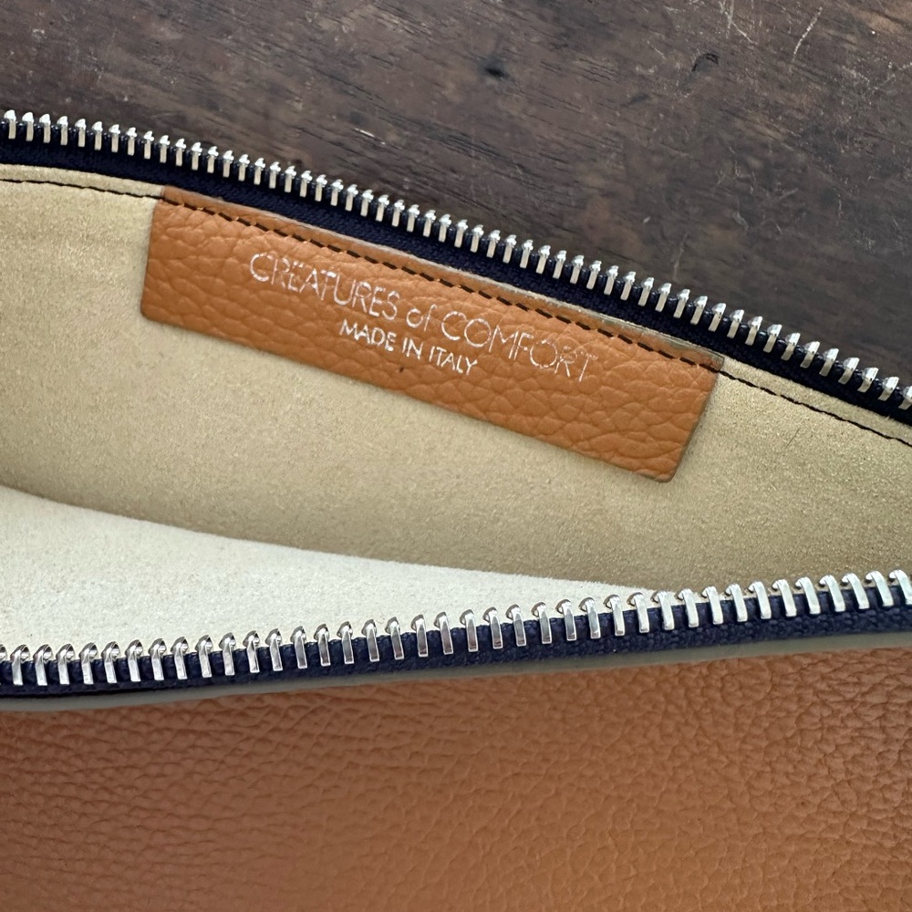 Multi-colored leather clutch by Creatures of Comfort